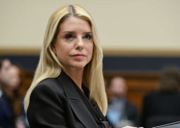 Attorney General Pam Bondi takes her seat before testifying before a House Judiciary Committee hearing on "Oversight of the Department of Justice" on Capitol Hill in Washington, D.C., on Feb. 11, 2026.