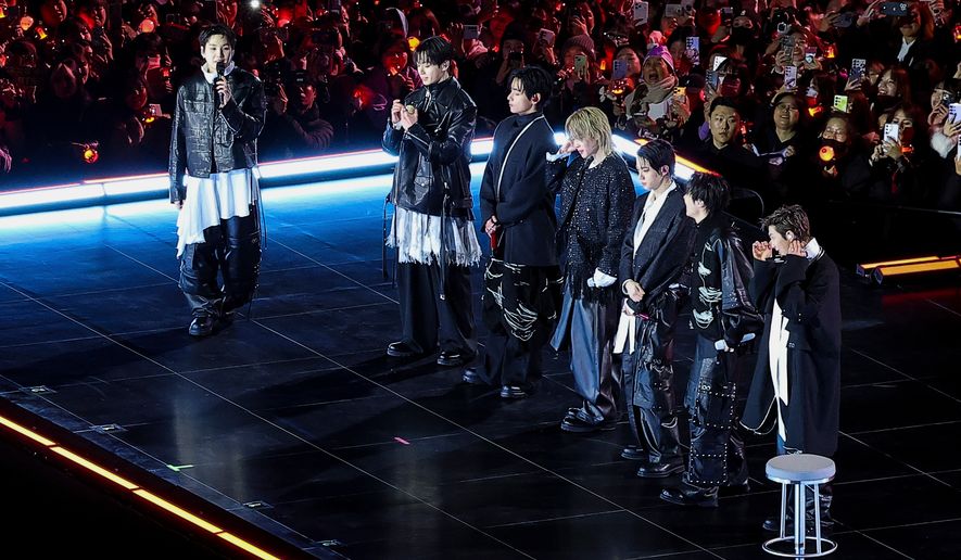 Kpop group BTS on stage during 'BTS The Comeback Live Arirang' concert in central Seoul, South Korea, March 21, 2026. (Kim Hong-Ji/Pool Photo via AP)