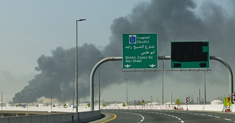 A plume of smoke rises from the port of Jebel Ali Sunday following an Iranian strike in Dubai, United Arab Emirates. News outlets reported Tuesday that a new strike targeted the U.S. consulate compound in the city.