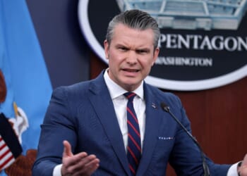 U.S. Secretary of War Pete Hegseth speaks during a news conference at the Pentagon in Arlington, Virginia, on March 2, 2026.