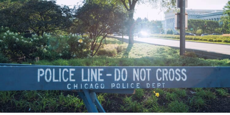 A Chicago crime scene is seen in a stock photo. Police are investigating the death of an 18-year-old college student who was shot early Thursday, allegedly by an illegal alien.
