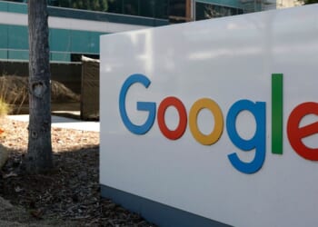 A sign is posted at Google headquarters in Mountain View, California. Three Iranian immigrants have been accused of conspiring to commit trade secret theft from Google and other leading technology companies.