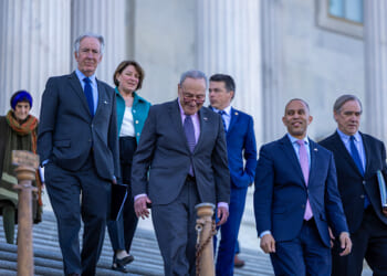 U.S. Senate Minority Leader Chuck Schumer (D-NY) and House Minority Leader Hakeem Jeffries (D-NY) walk out of the Capitol building to speak to the media on April 1, 2025