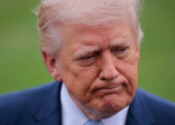 President Donald Trump stops to speak with reporters outside the White House on March 20, 2026, in Washington, DC.