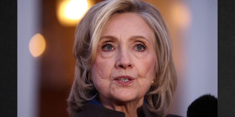Former Secretary of State Hillary Clinton speaks to the news media Thursday in Chappaqua, New York, after her deposition with the House Oversight Committee as they investigate links to convicted sex offender Jeffrey Epstein.