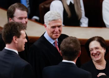 Supreme Court Associate Justices Brett Kavanaugh, Neil Gorsuch, and Elena Kagan arrive for President Joe Biden's State of the Union address during a joint meeting of Congress in the House chamber at the U.S. Capitol on March 7, 2024, in Washington, D.C.
