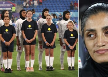 Iran women's head coach Marziyeh Jafari Baravati, right, looked on as players for Team Iran stood silently during the Islamic Republic of Iran's national anthem at the AFT Women's Asian Cup Monday in Australia.