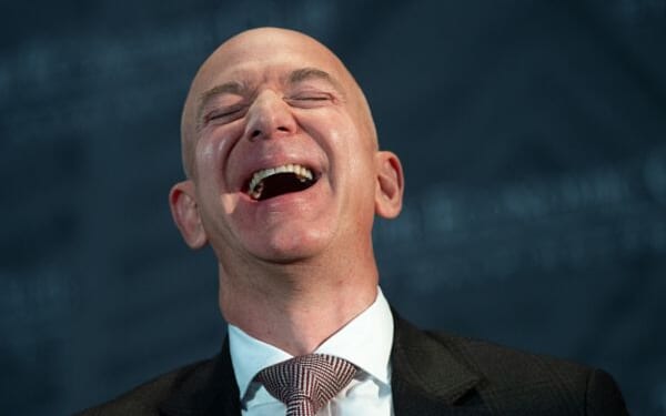 Jeff Bezos laughs at the Economic Club of Washington’s Milestone Celebration event on September 13, 2018.