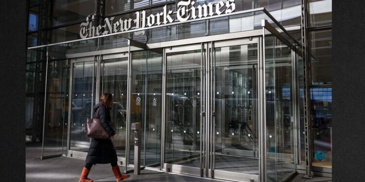 A person enters The New York Times building in New York City in a file photo dated Jan. 22 .
