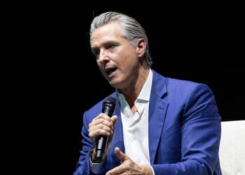 California Gov. Gavin Newsom sits at an event promoting his book "Young Man in a Hurry" on Feb. 28, 2026, in San Francisco, California.