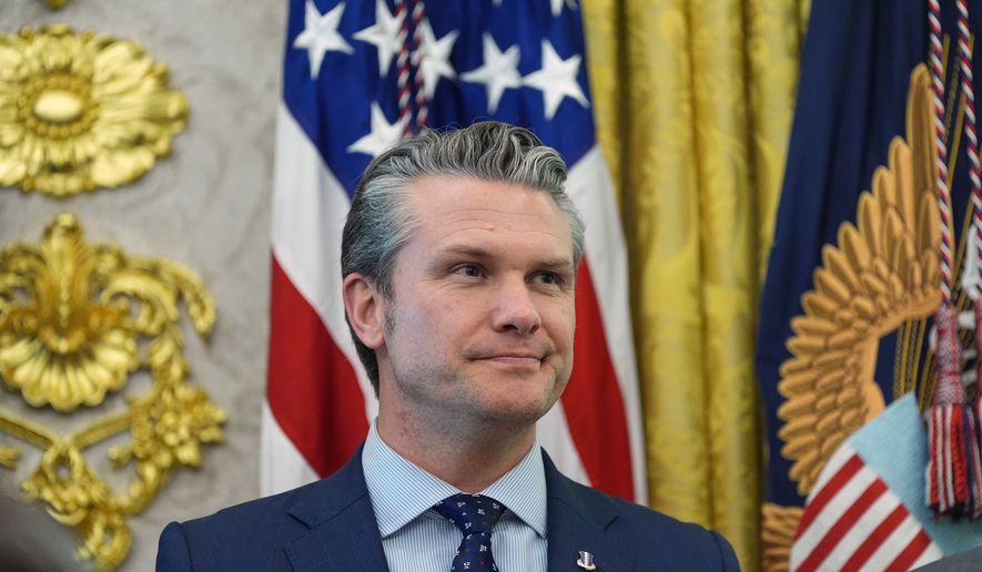 Defense Secretary Pete Hegseth listens as President Donald Trump speaks in the Oval Office of the White House, March 24, 2026, in Washington. (AP Photo/Alex Brandon, File)