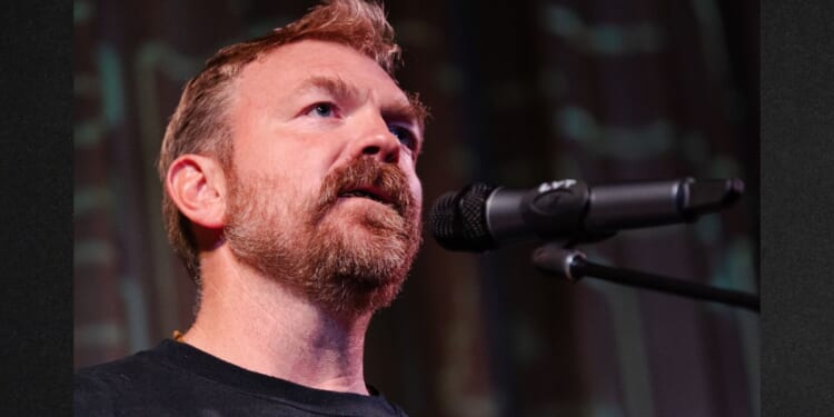 U.S. senatorial candidate Graham Platner, a Maine Democrat, is seen in an Oct. 22 file photo speaking at a town hall in Ogunquit, Maine.