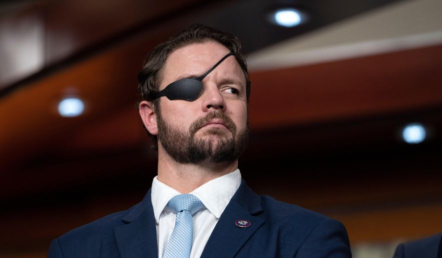 Rep. Dan Crenshaw, R-Texas, attends a news conference with Republicans, Jan. 4, 2023, on Capitol Hill in Washington. (AP Photo/Jacquelyn Martin, File)