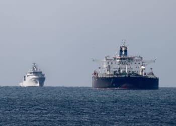 The Mozambican-flagged oil tanker "Deyna," suspected of belonging to the Russian's shadow fleet, is seen outside the coast of Martigues near the port of Marseille-Fos on Mars 23, 2026, as it's surveilled by the French Navy.