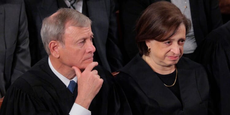 United States Chief Justice John Roberts and Associate Justice Elena Kagan attend the State of the Union address during a Joint Session of Congress at the U.S. Capitol on Feb. 24, 2026, in Washington, D.C.