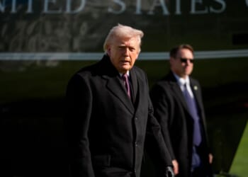 President Donald Trump steps of Marine One as he returns to the White House on March 18, 2026, in Washington, D.C.