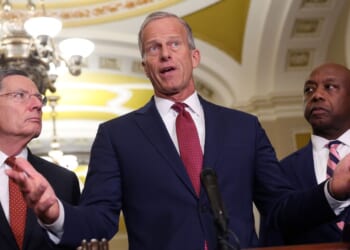 U.S. Senate Majority Leader John Thune of South Dakota , joined by his fellow Republicans Sen. John Barrasso of Wyoming, left, and Sen. Tim Scott of South Carolina, speaks to reporters March 3 following the weekly Senate Republican policy luncheon at the U.S. Capitol. Thune angered conservatives Monday with his latest excuse for not pushing to pass the SAVE America Act.