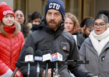Chicago Teachers Union Vice President Jackson Potter speaks to news media at rally on February 26, 2026.
