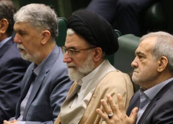 Iran's Minister of Intelligence Esmail Khatib, center, is pictured on Aug. 17, 2024, with Iran's President Masoud Pezeshkian (center right) before a speech to members of parliament in Tehran. Khatib was reportedly killed Tuesday night.