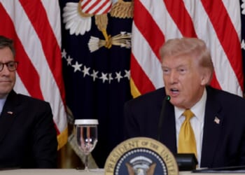 President Donald Trump and House Speaker Mike Johnson meet with reporters Monday in the East Room of the White House.