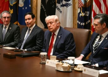 Secretary of State Marco Rubio, flanked by Health and Human Services Secretary Robert F. Kennedy Jr., Interior Secretary Doug Burgum, President Donald Trump, Defense Secretary Pete Hegseth, and Commerce Secretary Howard Lutnick, speaks during a Cabinet meeting in the Cabinet Room of the White House in Washington, D.C., on March 26, 2026.