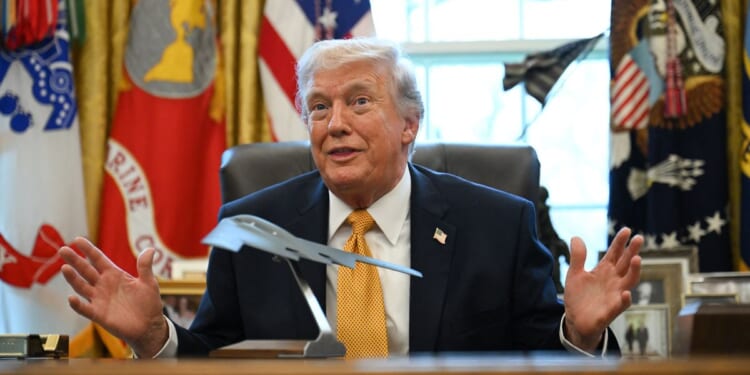 President Donald Trump speaks after signing an executive order in the White House's Oval Offie in Washington, DC on March 16, 2026.