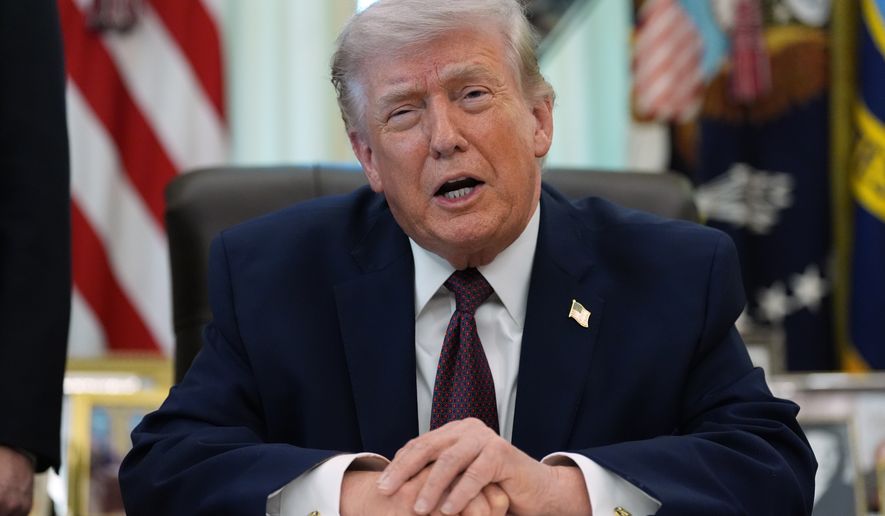 President Donald Trump speaks in the Oval Office of the White House before signing an executive order Tuesday, March 31, 2026, in Washington. (AP Photo/Alex Brandon)