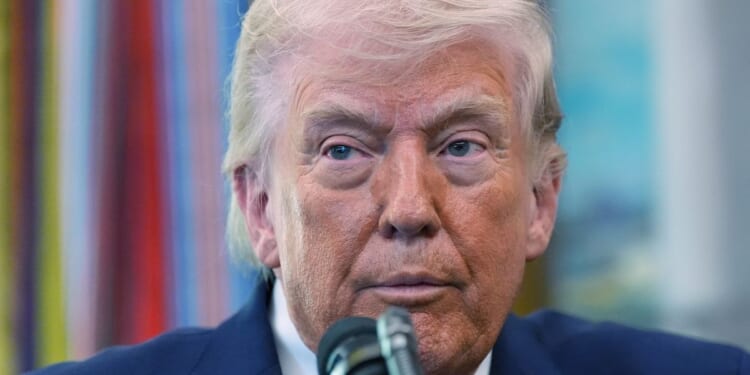 Trump showed off a classified map during a 2022 plane trip, a Democratic lawmaker alleges