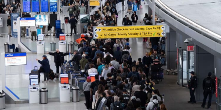 Travelers at John F. Kennedy airport are plagued by incredibly long wait times thanks to the ongoing partial government shutdown in New York on March 22, 2026.