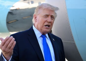 President Donald Trump speaks to reporters before boarding Air Force One at Palm Beach International Airport on March 23, 2026, in West Palm Beach, Florida.