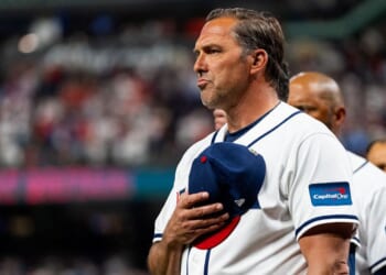 Manager Mark Deosa of the United States stands for the national anthem before a World Baseball Classic Pool B game between Great Britain and the United States at Daikin Park on March 7, 2026 in Houston, Texas.