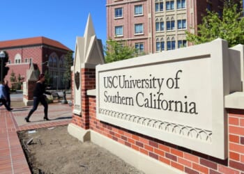 A sign welcomes people to the University of Southern California campus in Los Angeles in a file photo dated March 12, 2019.