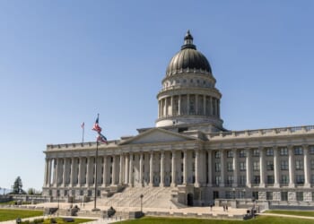 The Utah State Capitol building in Salt Lake City, Utah, with its distinctive copper dome and neoclassical columns.