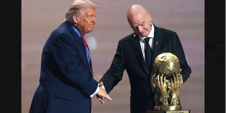 FIFA President Gianni Infantino presents President Donald Trump with the FIFA Peace Prize Dec. 5 during the draw for the 2026 soccer World Cup in Washington, D.C.