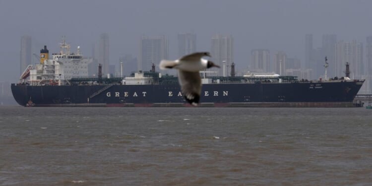 Iran hits Kuwait airport and a tanker off Qatar while strikes batter Tehran ahead of Trump speech