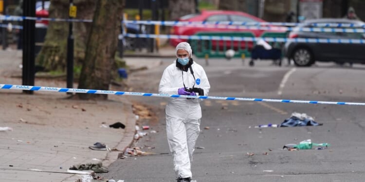 Man charged after a car plowed into a crowd outside a British pub