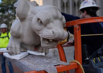 Final gargoyle returned to its perch atop rehabbed Kentucky cathedral modeled after Notre Dame
