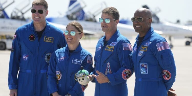 Artemis II astronauts bound for moon after rocketing away on NASA’s first lunar voyage in decades