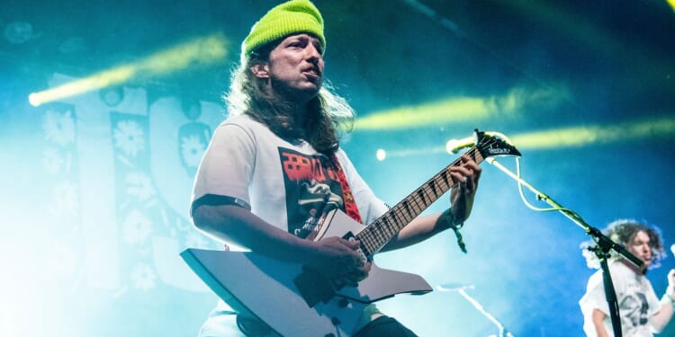 Former Turnstile guitarist is accused of hitting an ex-bandmate’s dad with his car