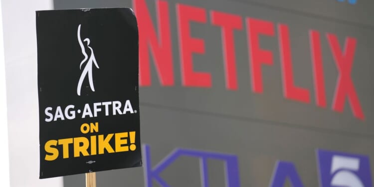 Screenwriters union and Hollywood studios reach four-year tentative agreement