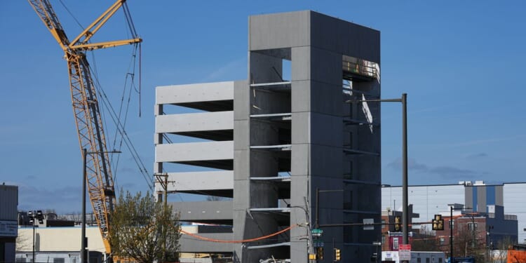1 killed and 2 missing after partial roof collapse at parking garage being built in Philadelphia