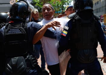 Venezuelan police block protesters demanding higher wages and pensions