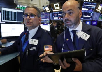Stocks waver and oil prices ease ahead of planned U.S.-Iran talks