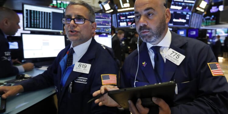 Stocks waver and oil prices ease ahead of planned U.S.-Iran talks