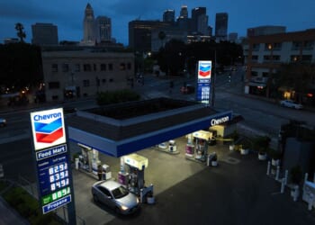 Chevron exec says that with high gas prices, Americans should drive less