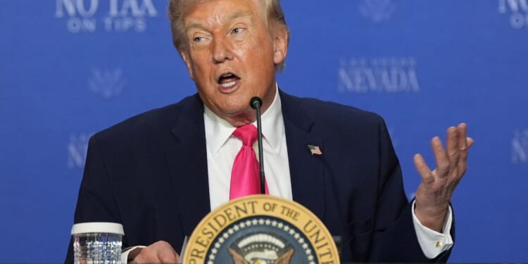 Trump bets his tax cuts will please Las Vegas voters on his swing West