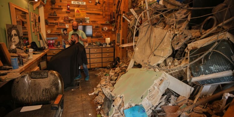 Macron says a French soldier was killed and 3 were wounded in attack on peacekeepers in Lebanon