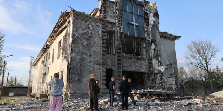 Russian attacks kill at least 2 as Ukraine strikes a Russian drone factory