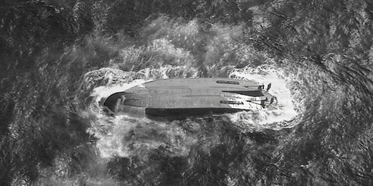 6 crew still missing after overturned ship that disappeared after typhoon is found near Saipan