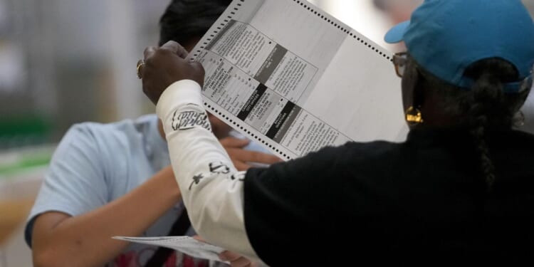 Lawsuit accuses DOJ of illegally compiling database to take over elections